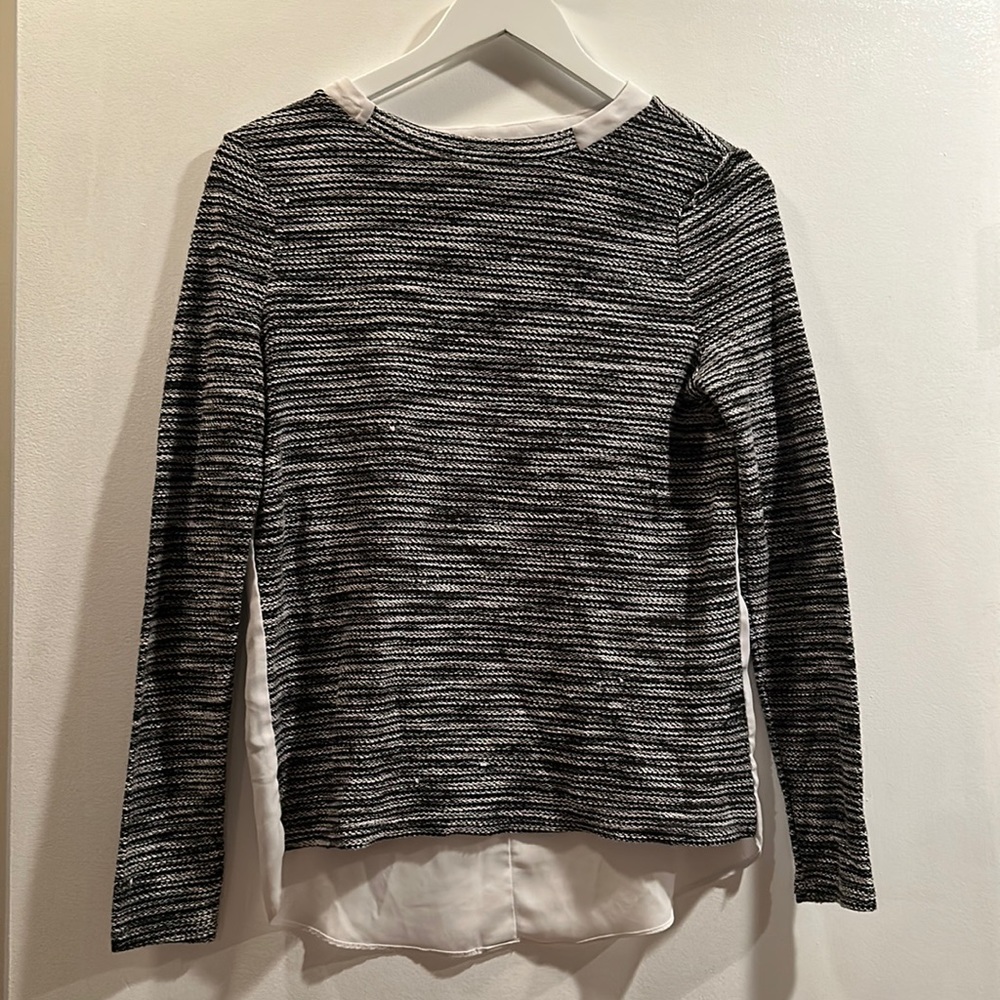 Super cute blouse with airy back. Bought in Germany.